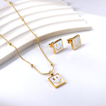 Square White Shell with Smiley Face Set Steel/Gold asonjewelry