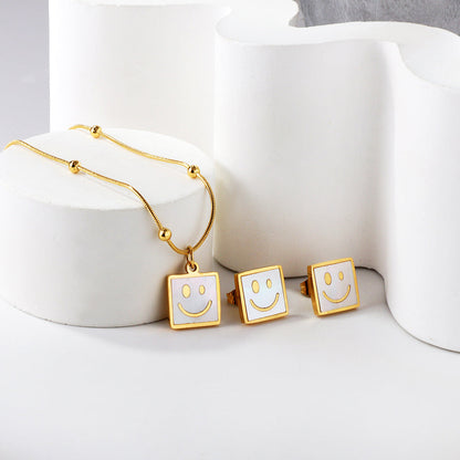 Square White Shell with Smiley Face Set Steel/Gold asonjewelry