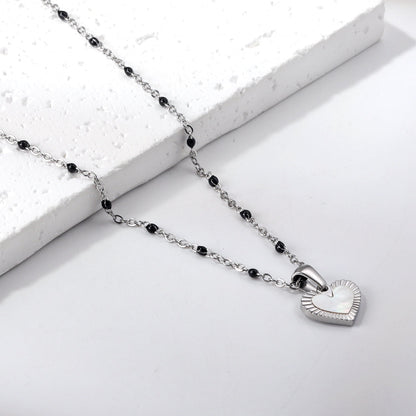 Heart shaped white oil drop pendant + black bead necklace 48+5cm asonjewelry