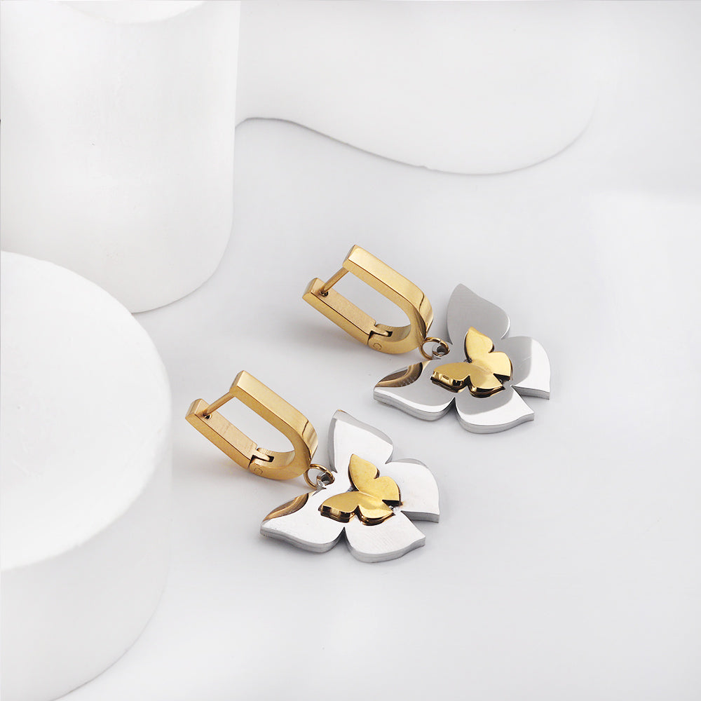 Gold coloured U-shaped ear clips with graduated gold sized butterfly studs asonjewelry