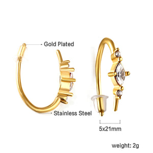 Gold coloured U-shaped stud earrings with white diamonds