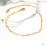 Multiple crosses anklet 23+5cm gold color