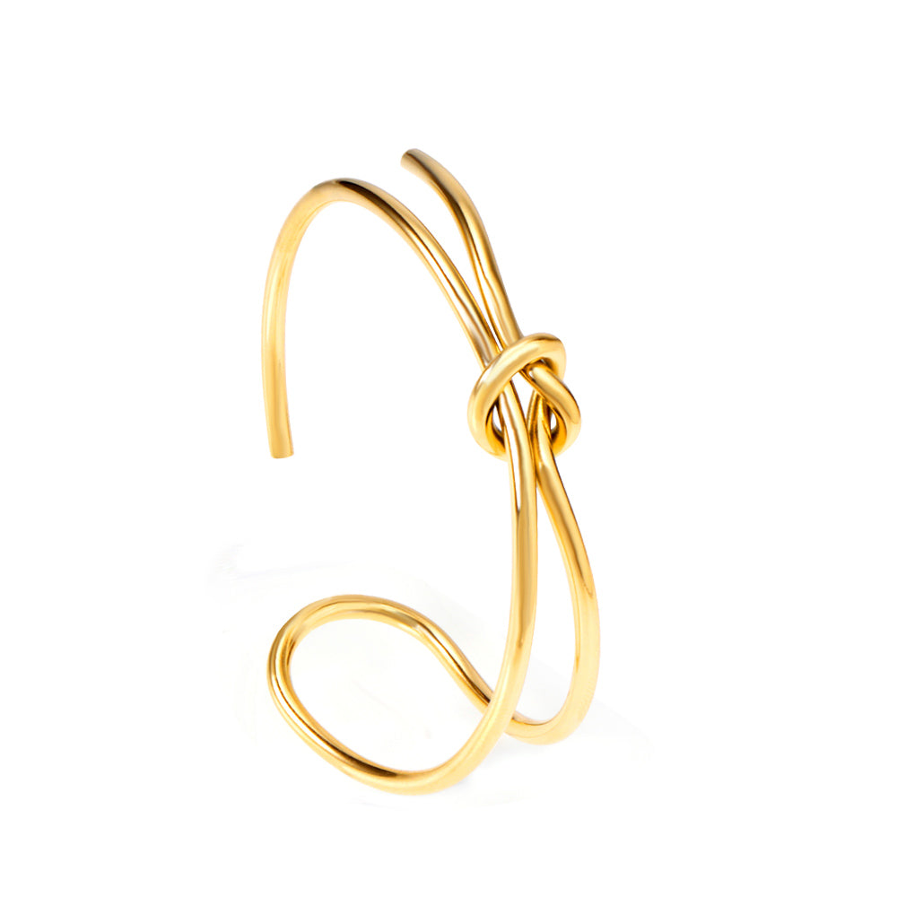 Hard bangle with minimalist clasp shape in gold color asonjewelry