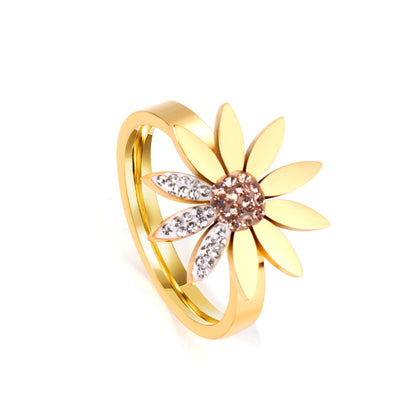 A large chrysanthemum with three leaves set with diamonds ring asonjewelry