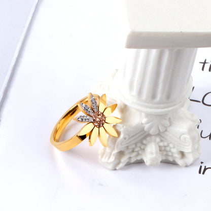 A large chrysanthemum with three leaves set with diamonds ring asonjewelry