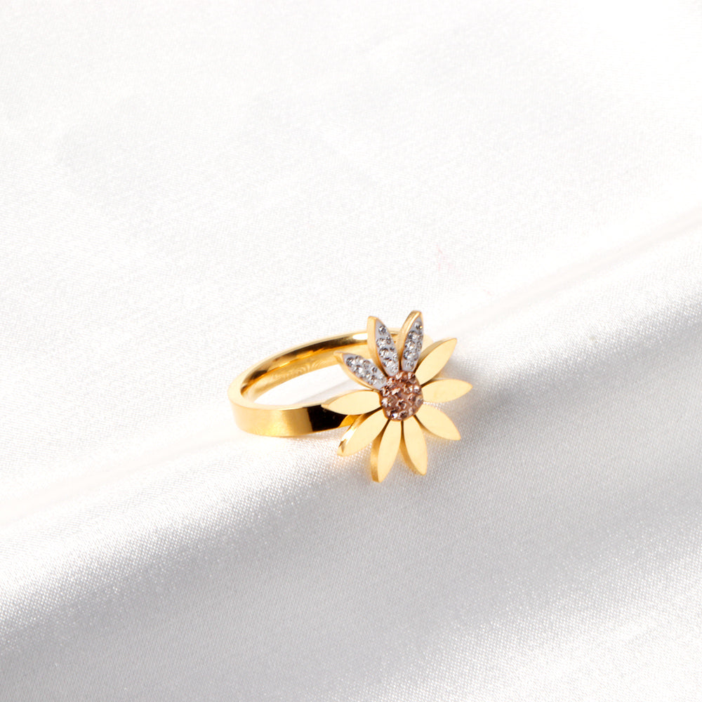 A large chrysanthemum with three leaves set with diamonds ring asonjewelry