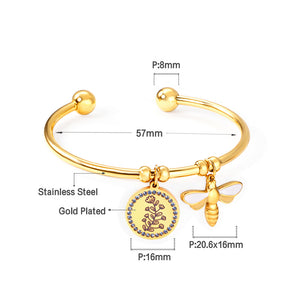Hard bracelet with butterfly and flower charms
