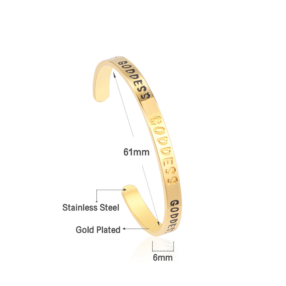 Gold colored hard bracelet with GODDESS printed on it asonjewelry