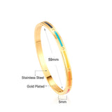 Hard bracelet with rectangles in different colors with oil drops on the surface