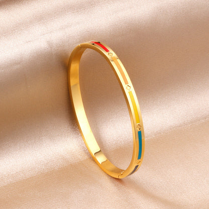 Hard bracelet with rectangles in different colors with oil drops on the surface asonjewelry