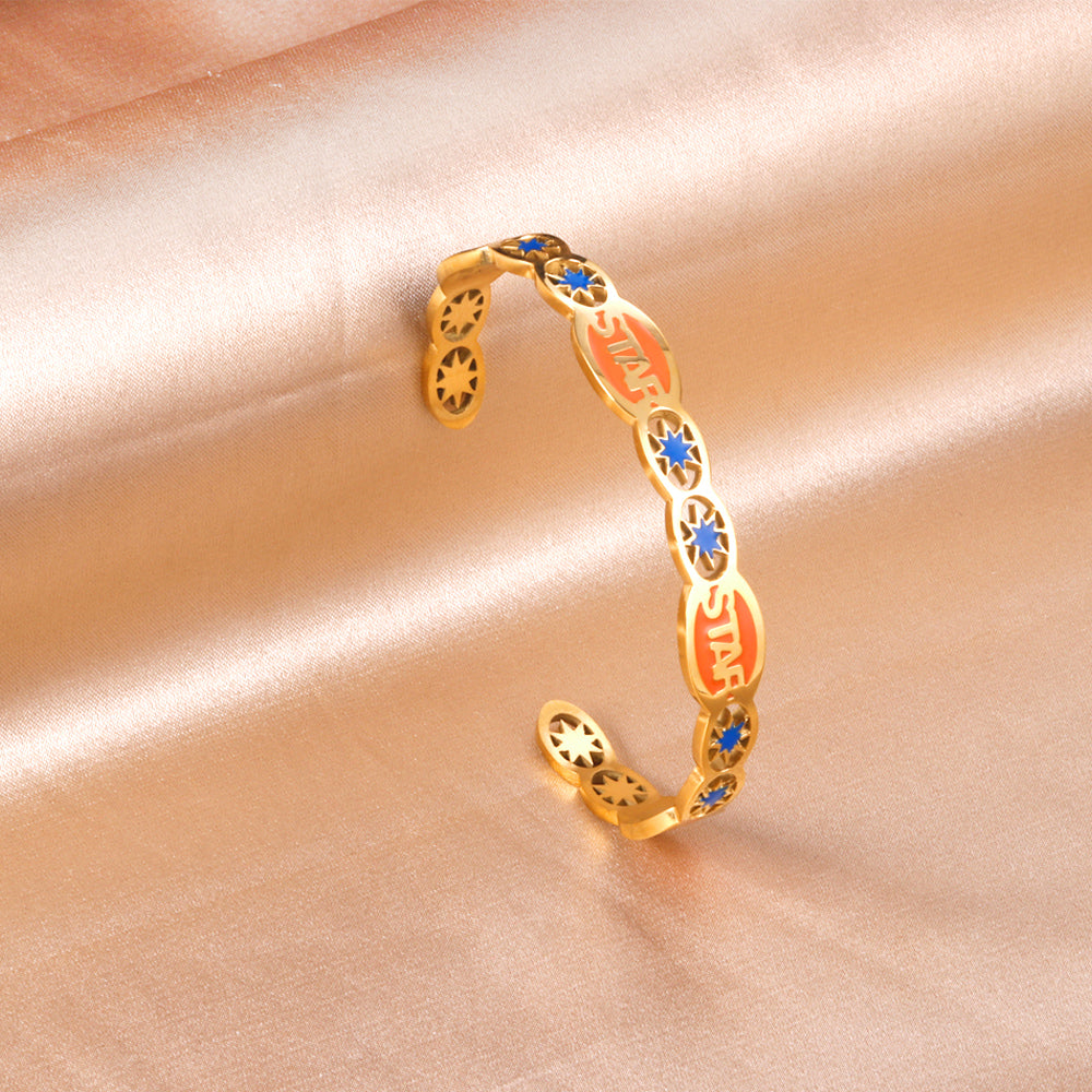 Hard bangle with many colors on the surface with drops of oil and shells in open gold color asonjewelry