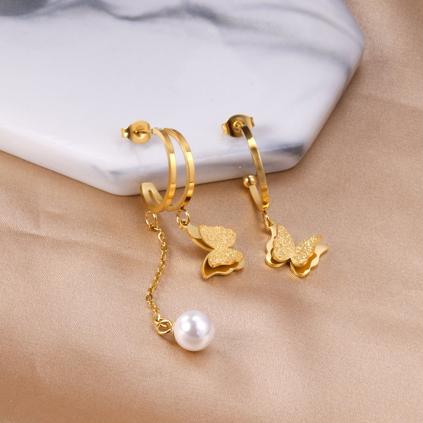 Semi-circle earrings + butterfly + pearl studs asonjewelry
