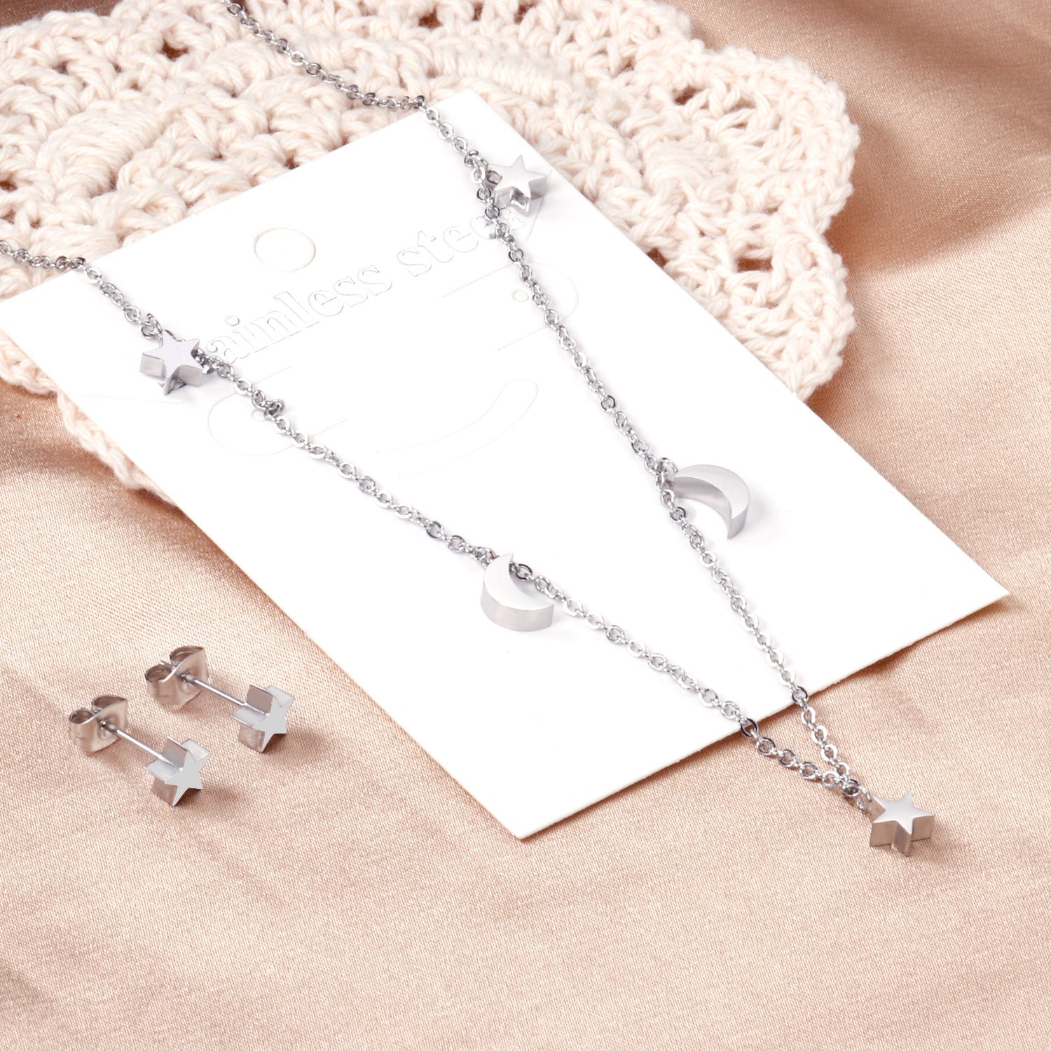 Set of 3 stars + 2 moons in glossy steel / gold color asonjewelry