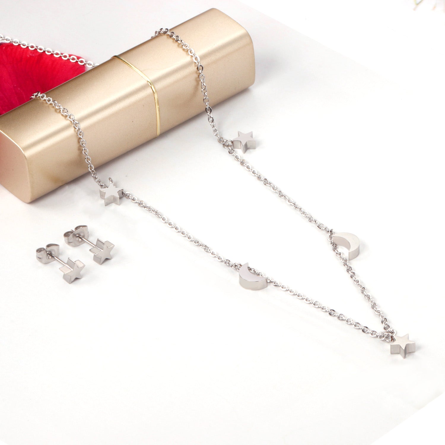 Set of 3 stars + 2 moons in glossy steel / gold color asonjewelry