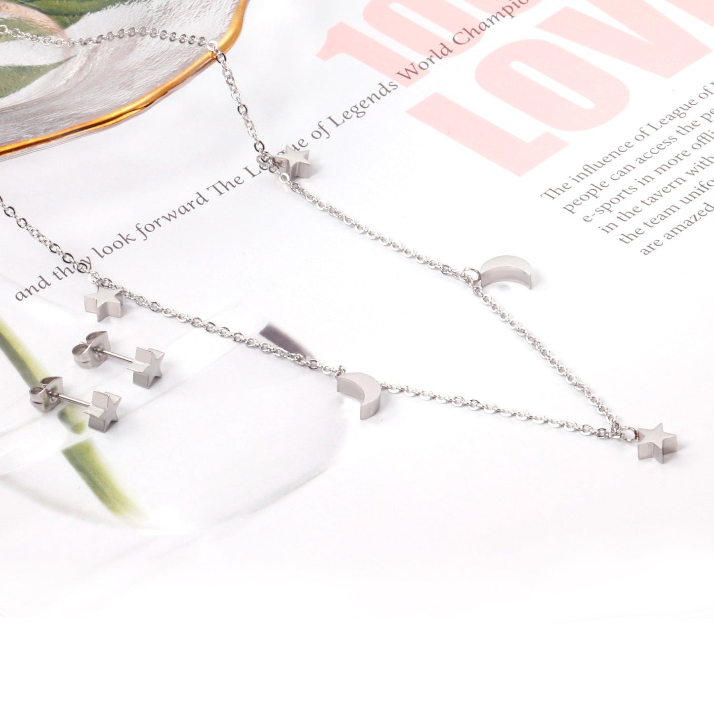 Set of 3 stars + 2 moons in glossy steel / gold color asonjewelry