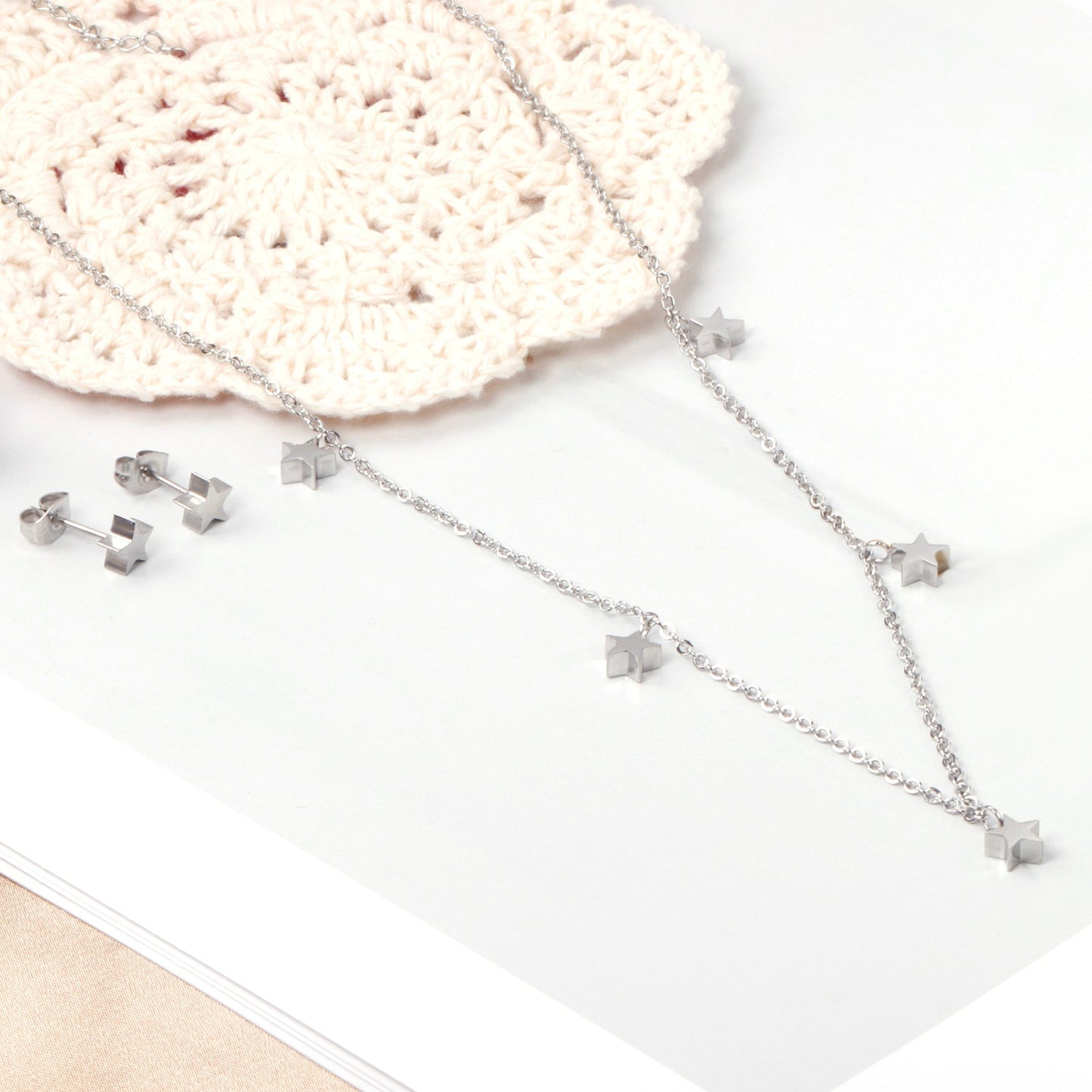 Set of 5 stars glossy steel/golden asonjewelry