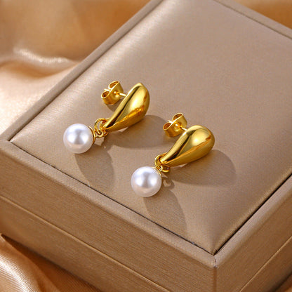 Minimalist smooth grain stud earrings with a pearl. asonjewelry