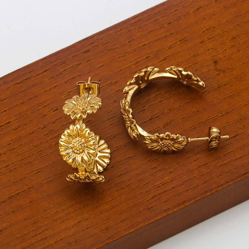 Stainless steel fresh simple personality retro C-shaped small daisy flowers female 18K gold earrings asonjewelry