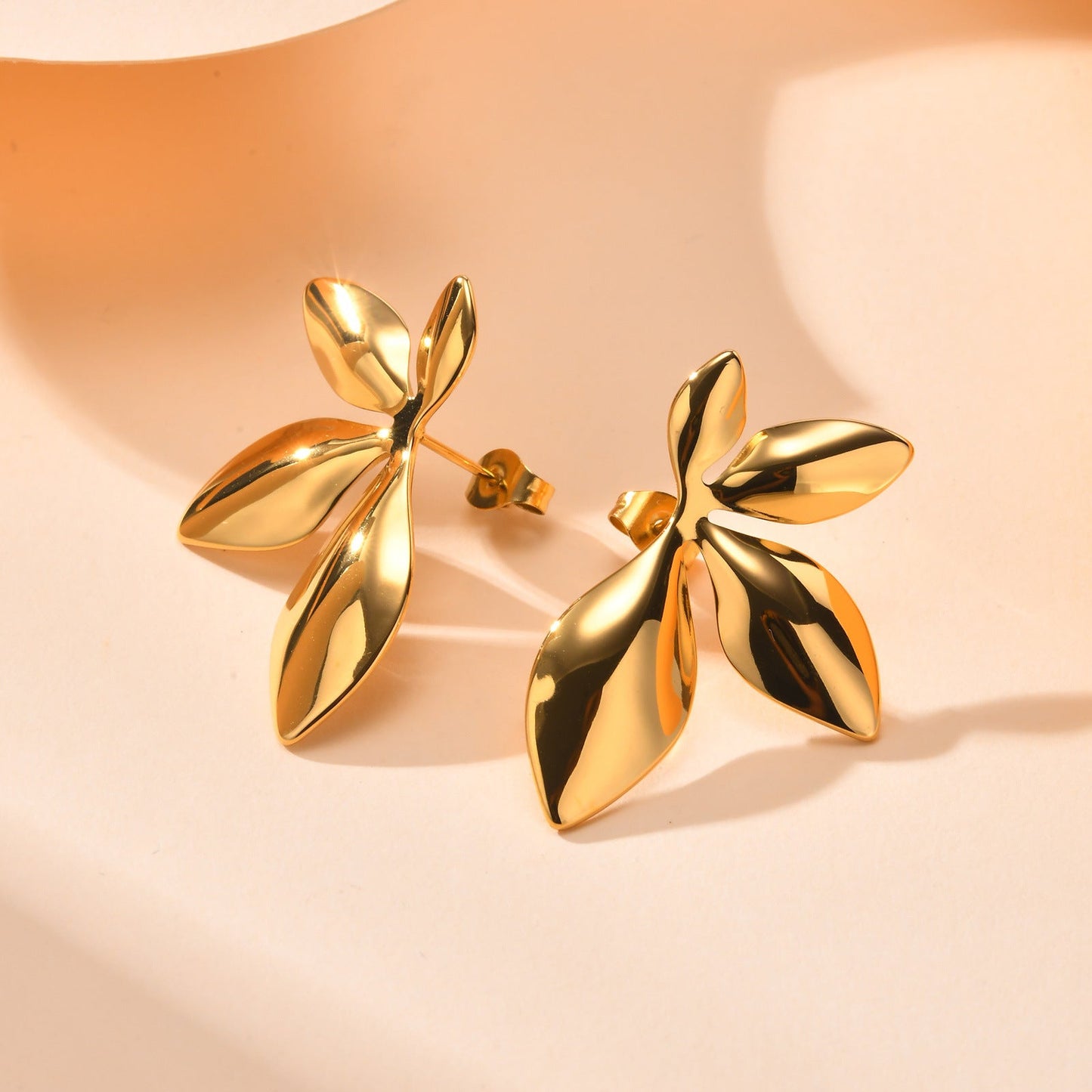 Stainless steel 4 leaves earrings 18K gold fashion personality asonjewelry