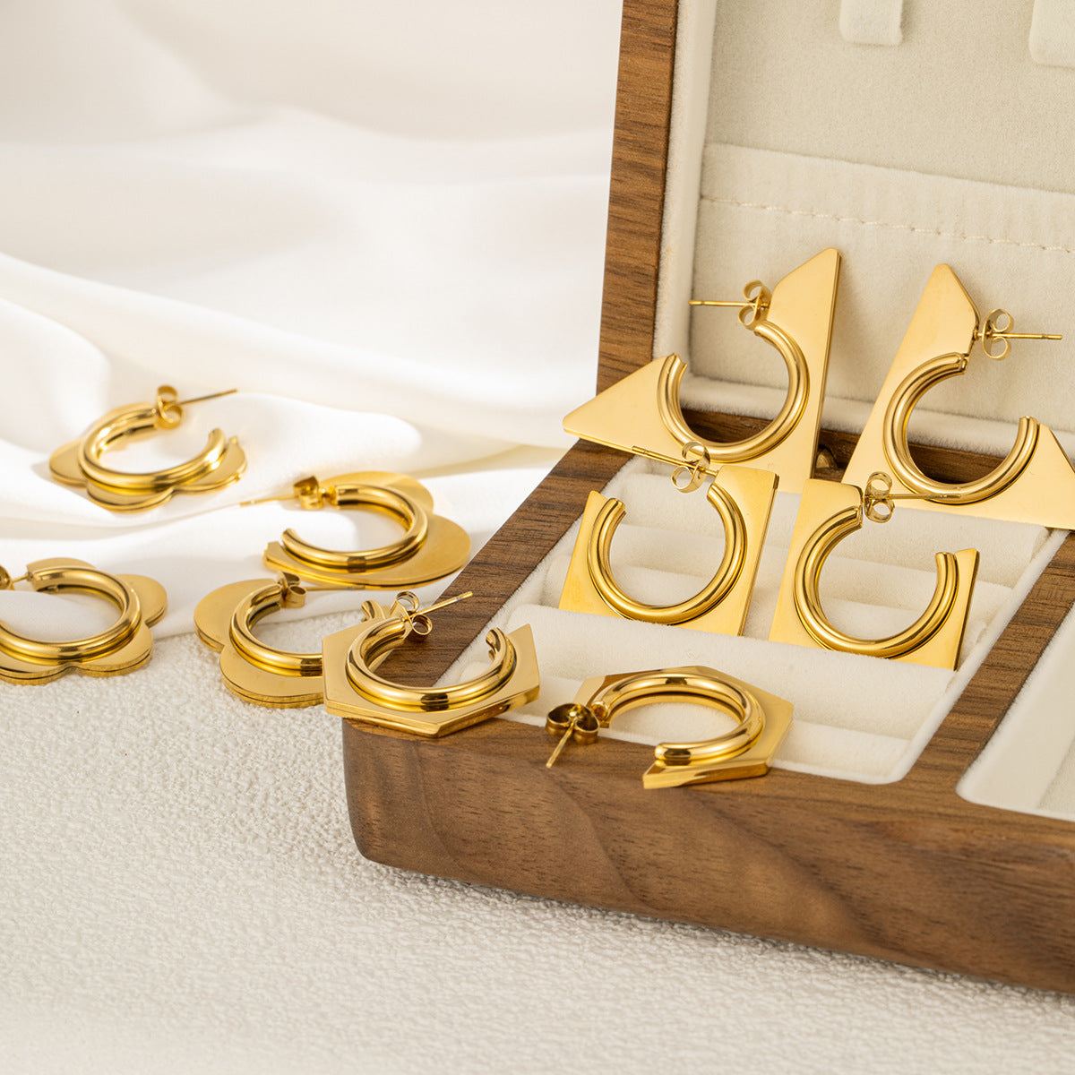 Stainless steel 18k personalized geometric earrings female European and American French inlaid diamond light luxury ear buckle earrings wholesale asonjewelry