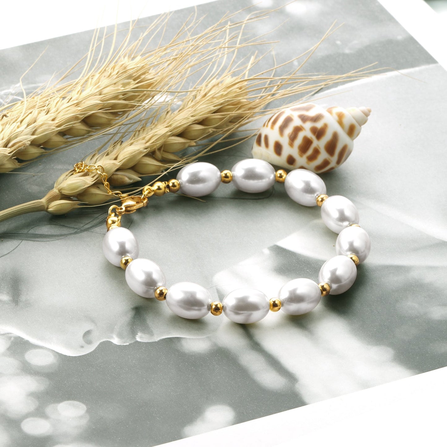 Steel and gold pearl with steel beads bracelet 10*13mm 20+5cm asonjewelry