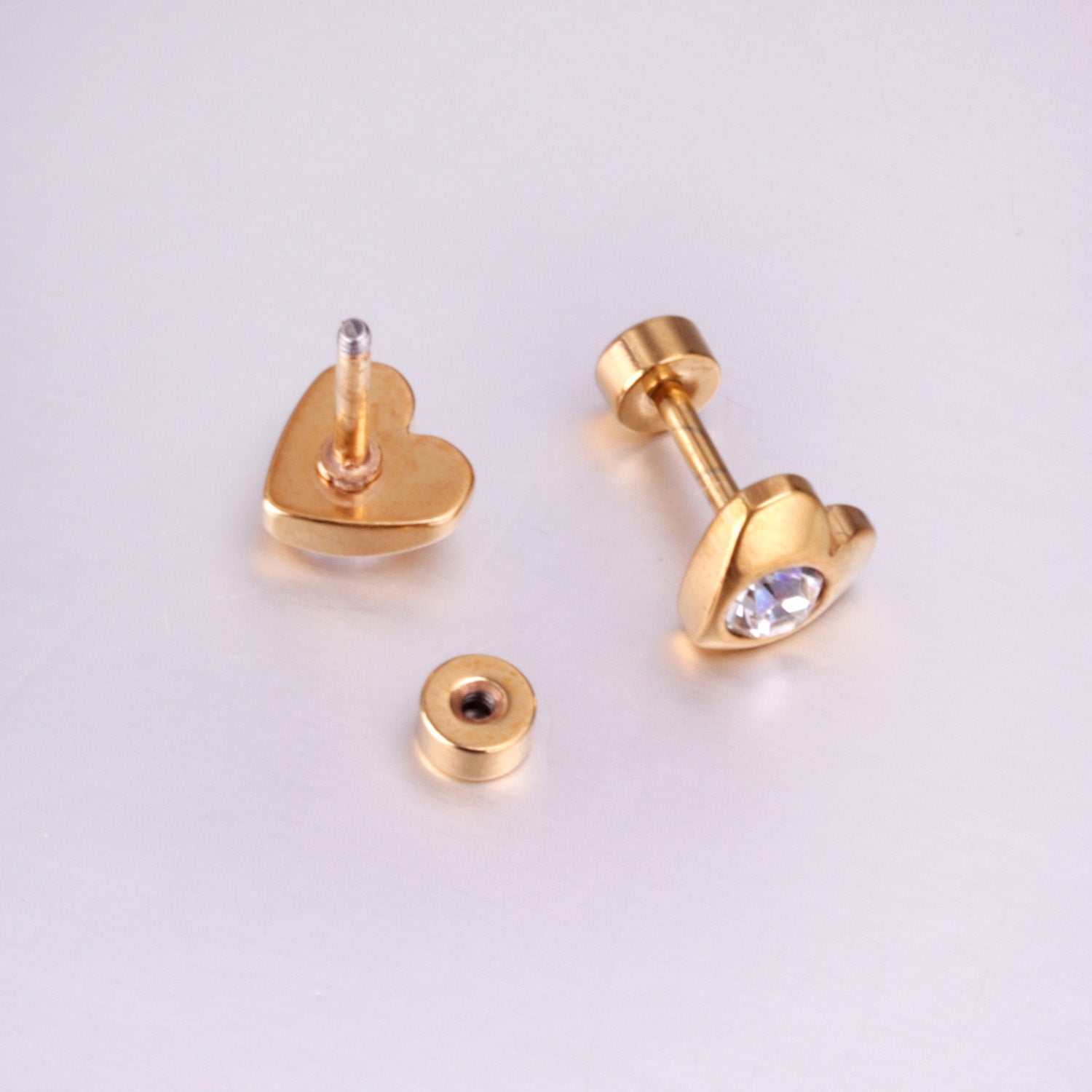 12 pairs 7mm steel/golden heart mix/white diamond screw plugs asonjewelry