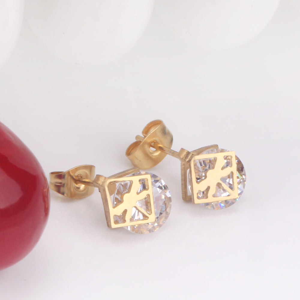 Gold/steel set with zirconia + two wispy dragonfly shapes wrapped in squares asonjewelry