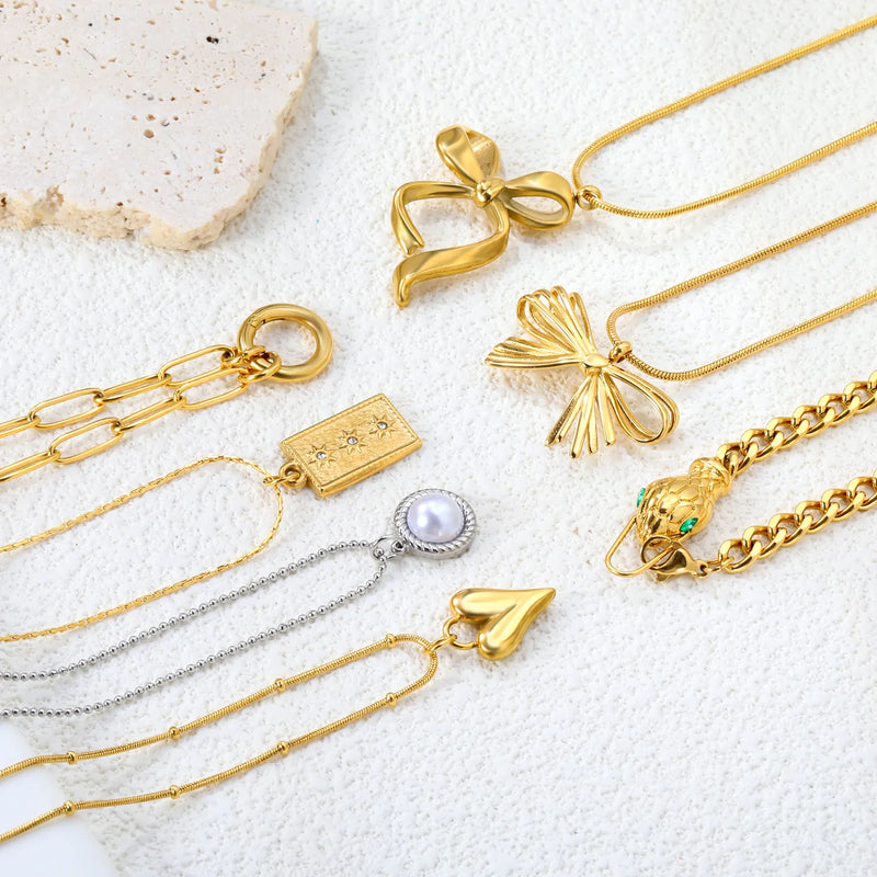 Wholesale 12.2×15 mm~24×32 mm Gold Stainless Steel Necklace Assortment | Heart, Bow, Snake Head Pendant Variety Pack for Retailers