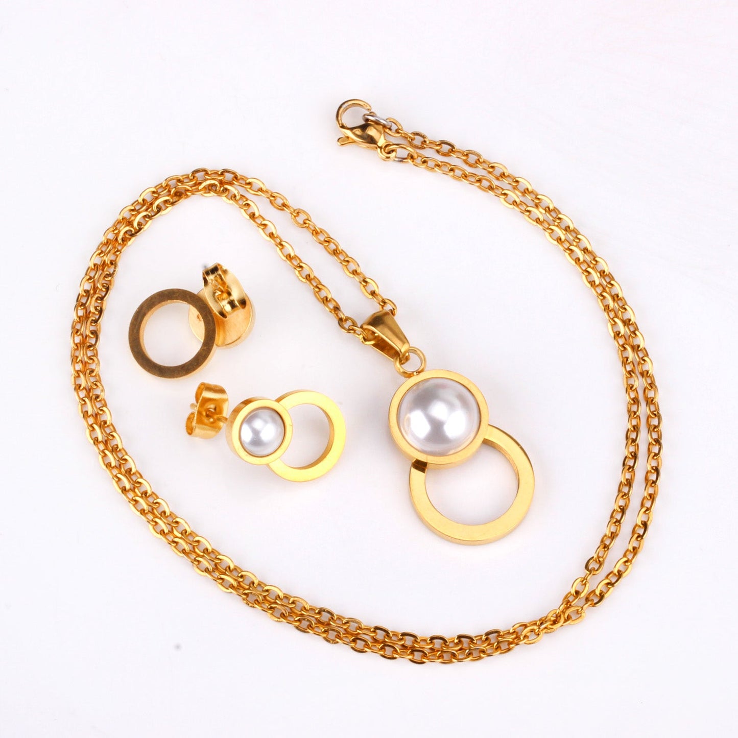 Steel/golden figure 8 shape with pearl + wisp round jewelry set asonjewelry