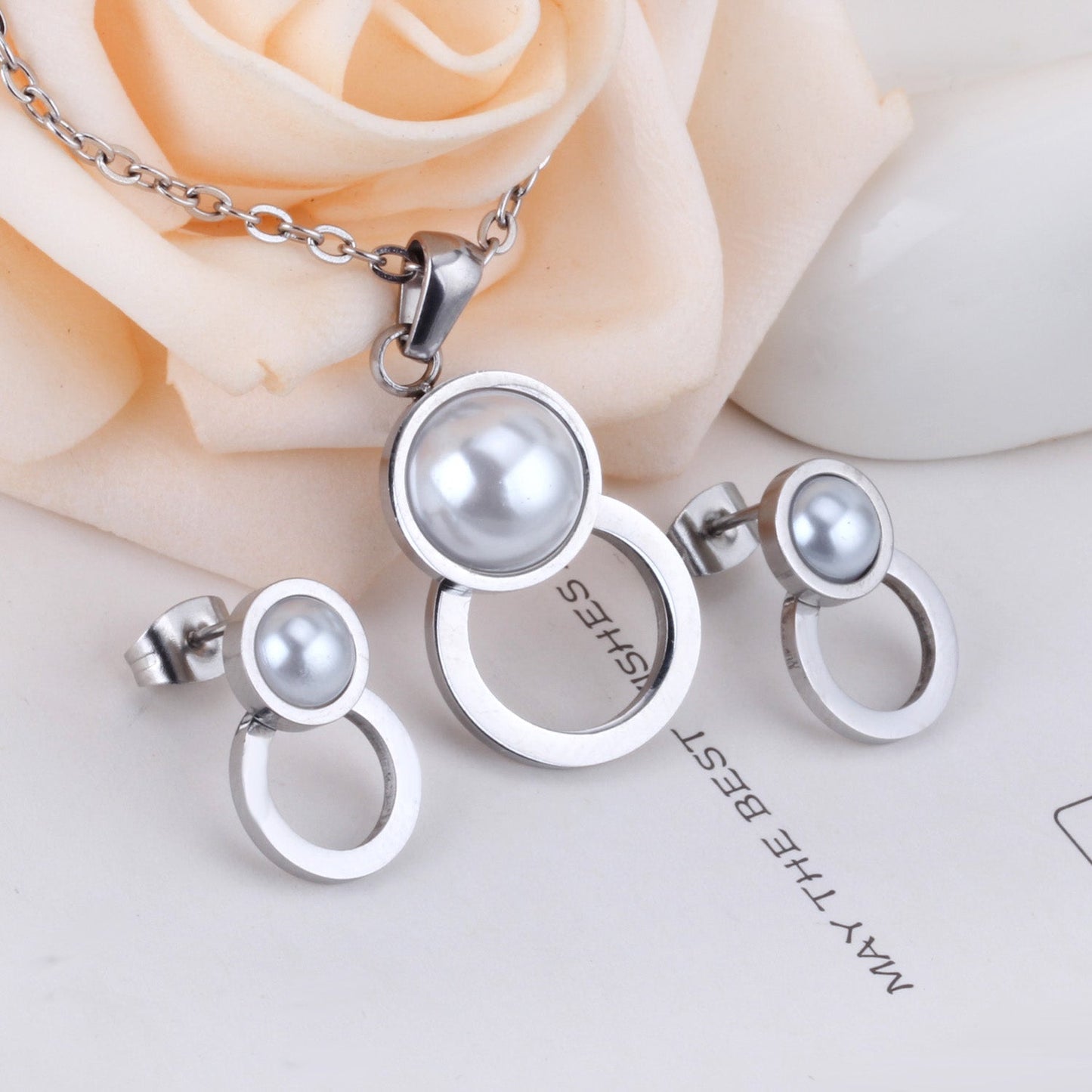 Steel/golden figure 8 shape with pearl + wisp round jewelry set asonjewelry