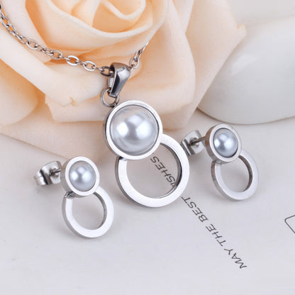 Steel/golden figure 8 shape with pearl + wisp round jewelry set asonjewelry