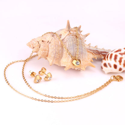 Gold/Steel Heart Jewelry Set with Diamonds in the Middle asonjewelry