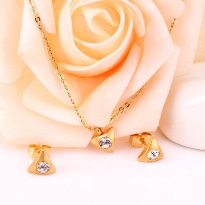 Gold/steel triangle jewelry set with diamond in the center asonjewelry