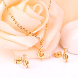 Gold/Steel Music Note Cut Jewelry Set with Diamonds