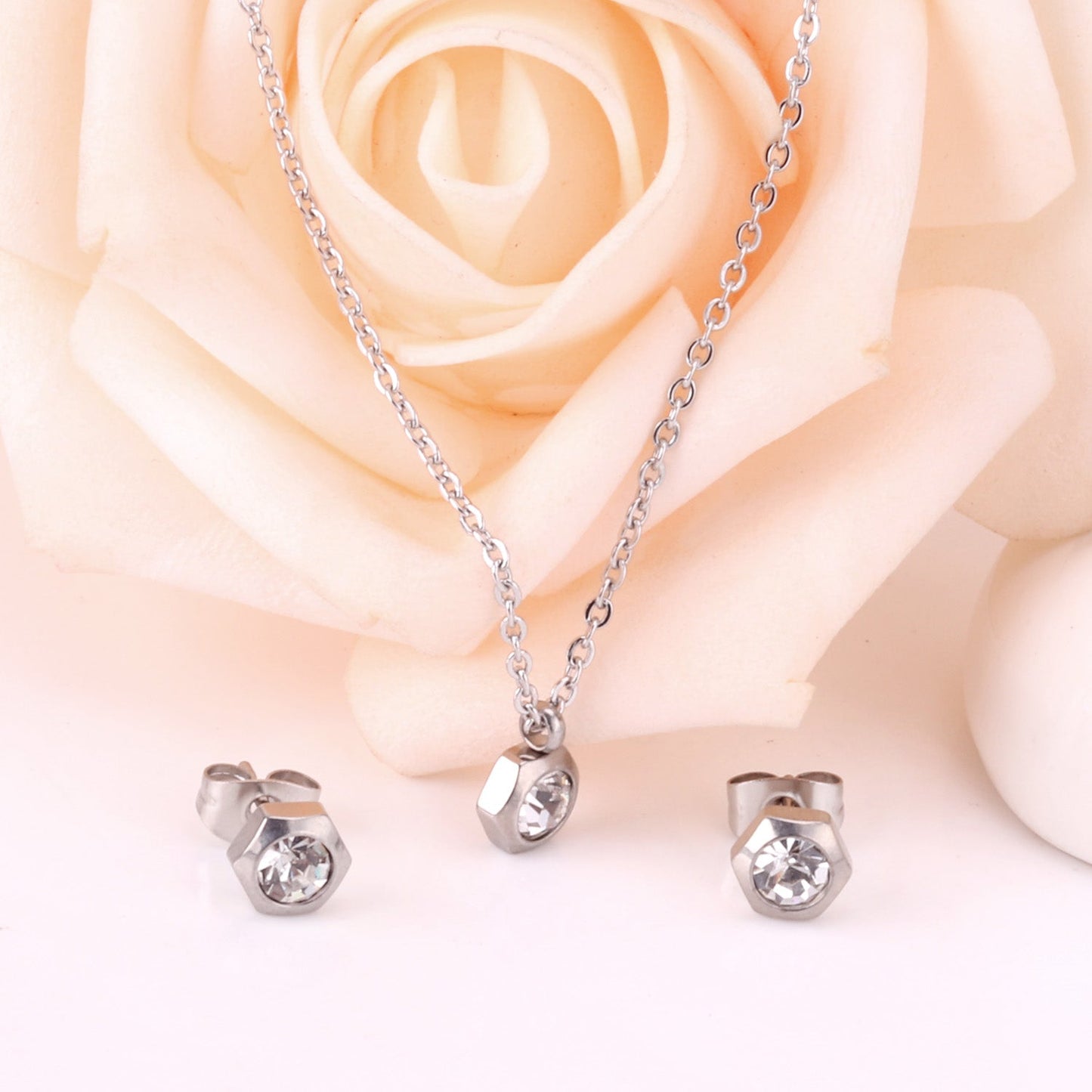 Gold/Steel Hexagon Jewelry Set with Diamonds in the Middle asonjewelry