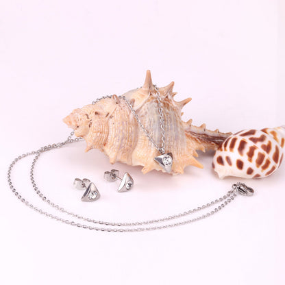 Gold/steel triangle jewelry set with diamond in the center asonjewelry