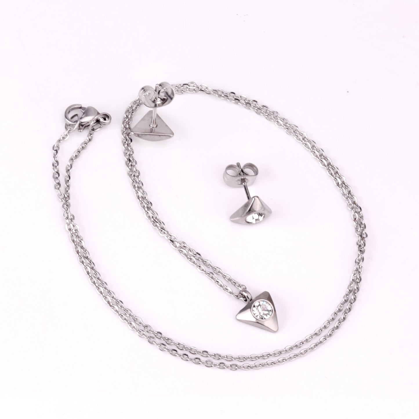 Gold/steel triangle jewelry set with diamond in the center asonjewelry