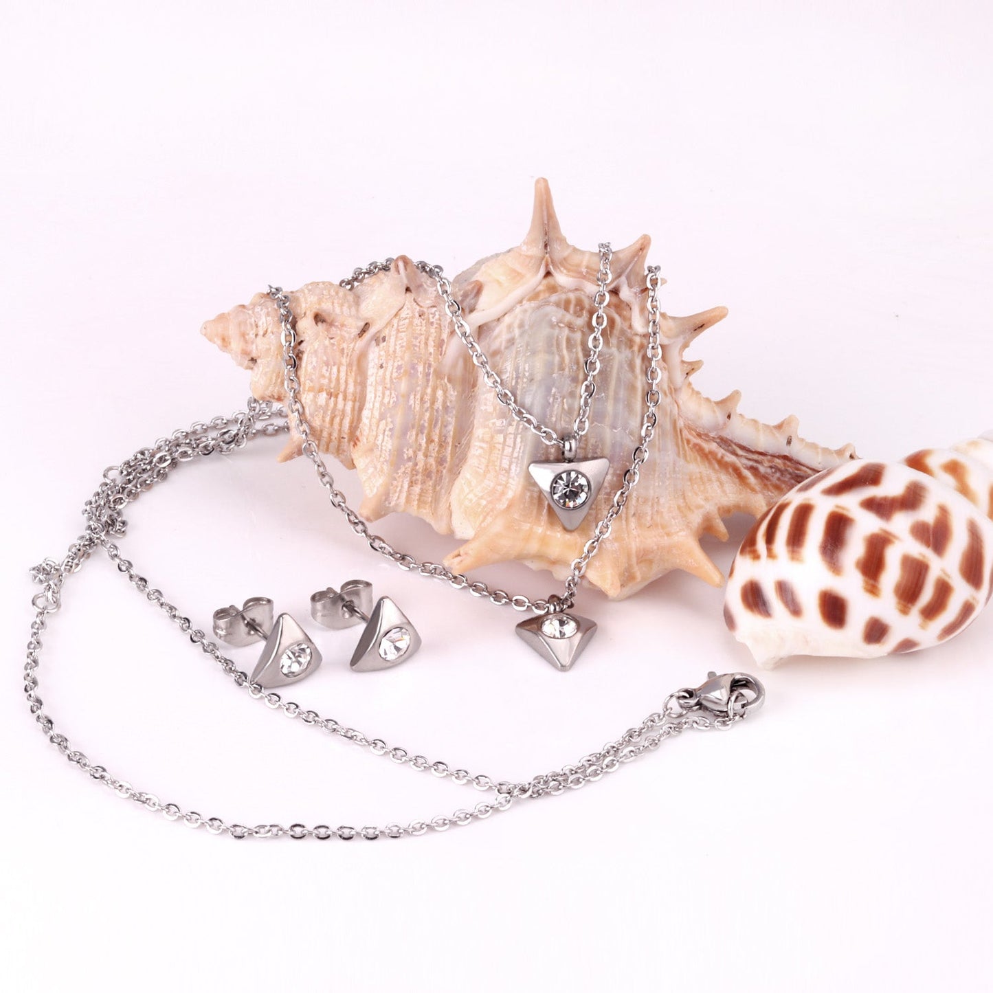 Gold/steel triangle double chain pendant set with diamond in the middle asonjewelry