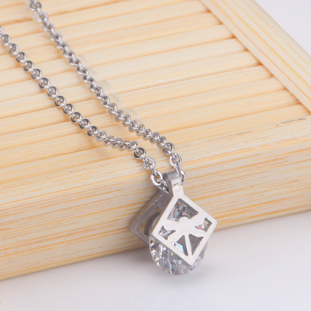 Gold/steel set with zirconia + two wispy dragonfly shapes wrapped in squares asonjewelry