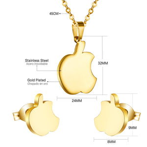 Set of jewels in gold/steel with a smooth surface of an apple with a bite.