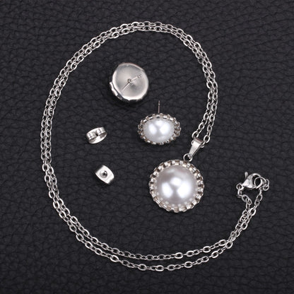 Gold/steel half pearl standing on top of round cake jewelry set asonjewelry