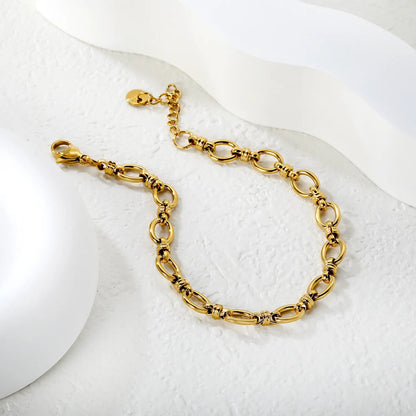 Width 7mm, thickness 1.4mm, oval chain, 18+3cm+6mm round end, brand name, bracelet, steel color/golden color asonjewelry