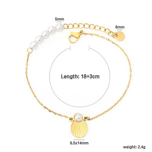 9.5*14mm shell pearl, 2mm cross chain, 5 pieces of 5mm pearls, 18+3cm+6mm round tail tag. Hand chain in gold color.