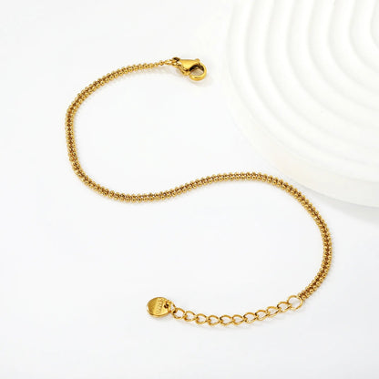 Width: 2.3mm, Thickness: 1.2mm. Double-bead chain, 17+3cm+6mm in length. Round tail style bracelet. Steel color/Gold. asonjewelry