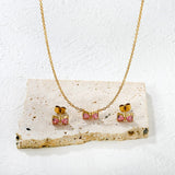 Brogan white diamond/pink diamond stud earrings: 9.3*5mm. Necklace: 9.3*5mm. 0.35 cross chain. 40 + 5cm + 6mm round tail tag.