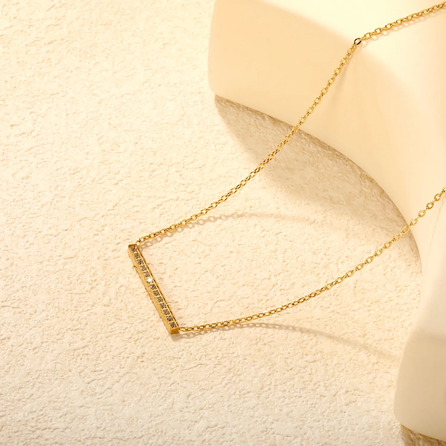 29.6 * 2.6mm single-cut CNC diamond pendant with 0.4 cross chain, 40 + 5cm + 6mm round tail tag. Necklace in gold asonjewelry