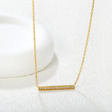 29.6 * 2.6mm single-cut CNC diamond pendant with 0.4 cross chain, 40 + 5cm + 6mm round tail tag. Necklace in gold asonjewelry