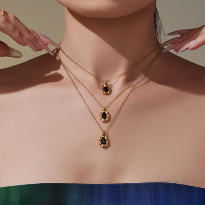 Elliptical Black Zircon Necklace Gold 05 Cross Chain 40+5+4.5*8.6mm Elliptical Tag Pendant 10.3*18.2mm Stone 4.9*7mm